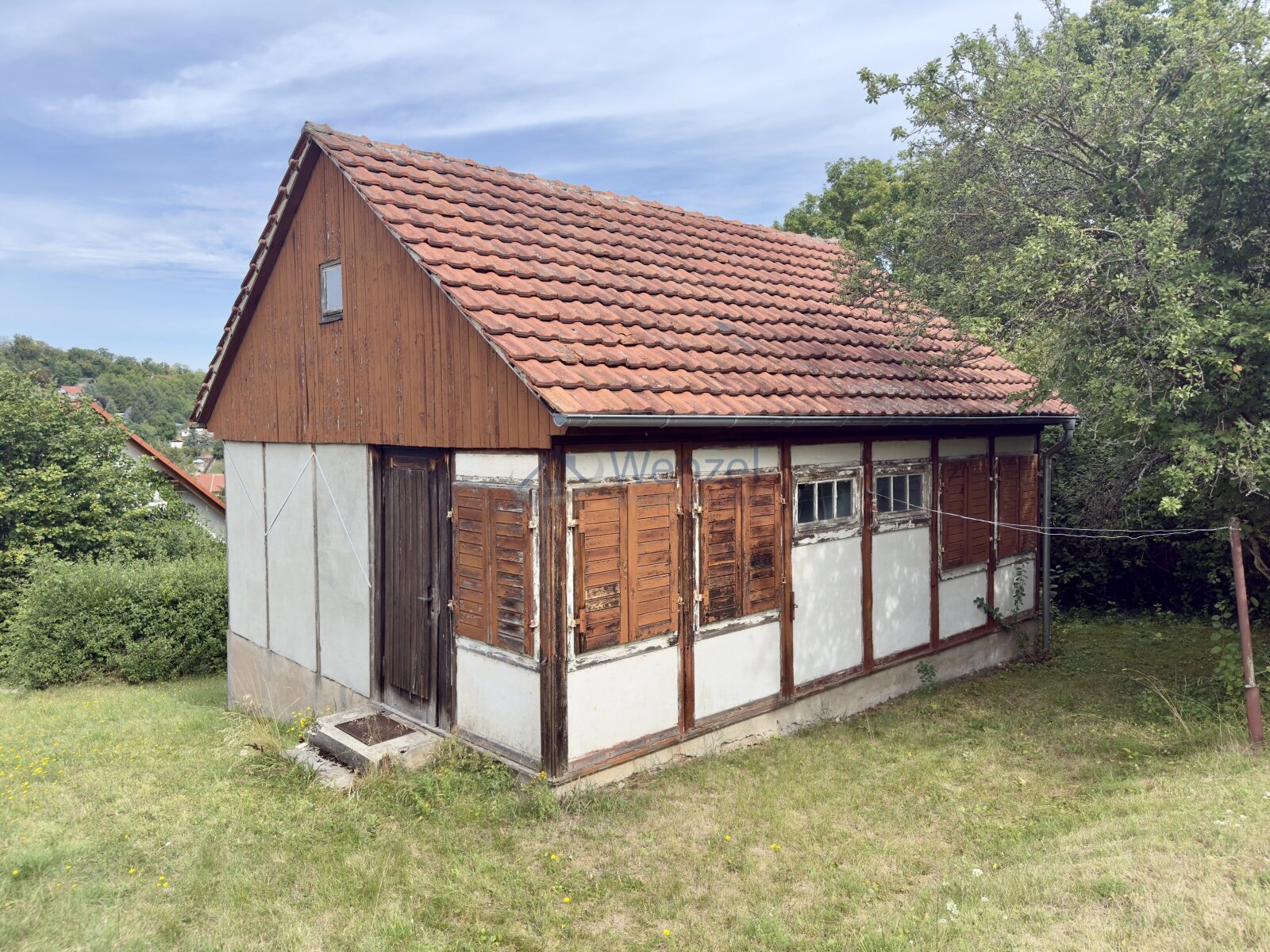 Erholungs-Grundstück mit vier Bungalows im Paket!